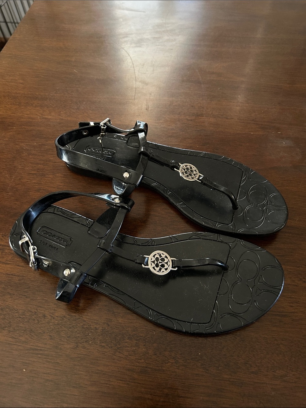 Coach Black Jelly T-Strap Sandals with Silver Medallion